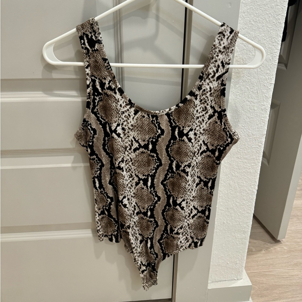 Snakeskin print body suit